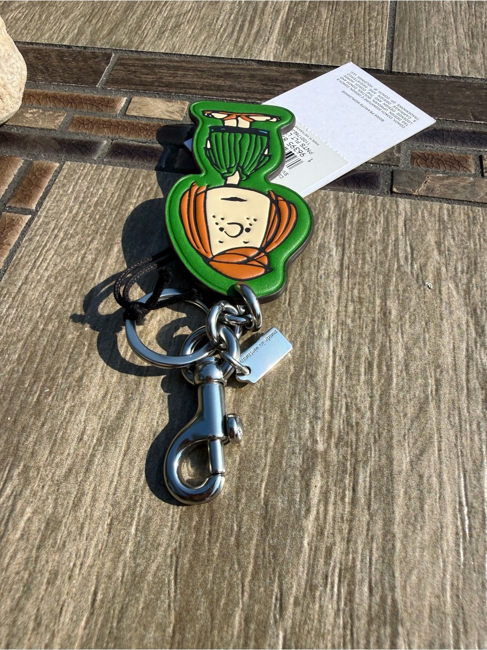 NWT Coach x Peanuts
Peppermint Patty Bag Charm Keychain - Picture 4 of 6